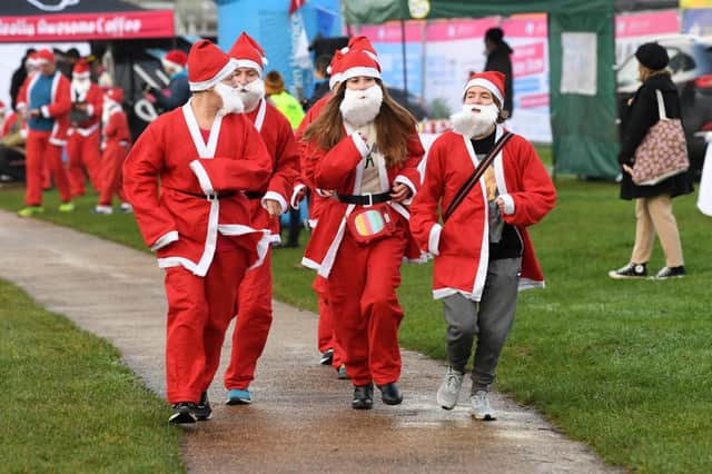 Dozens of Santas turned out for the annual Willen Hospice charity Santa Dash on Sunday (19/12)
