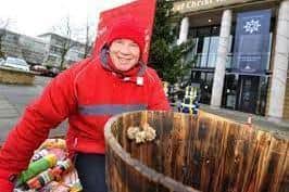 Cllr Sam Crooks has braved the cold to collect cash outside the church in previous years