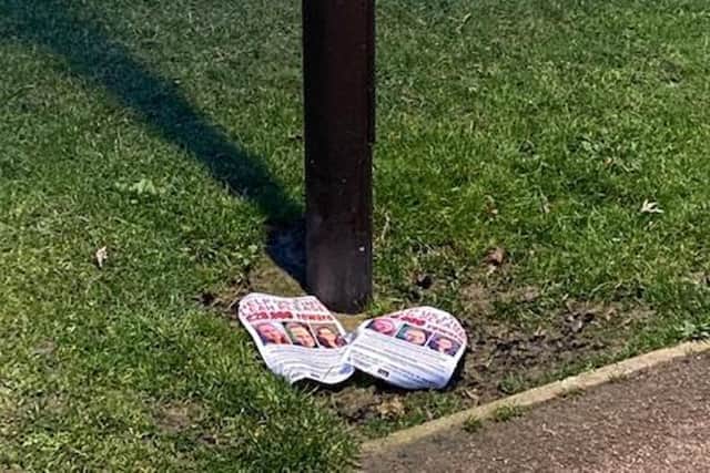 The posters were cut down and left in situ