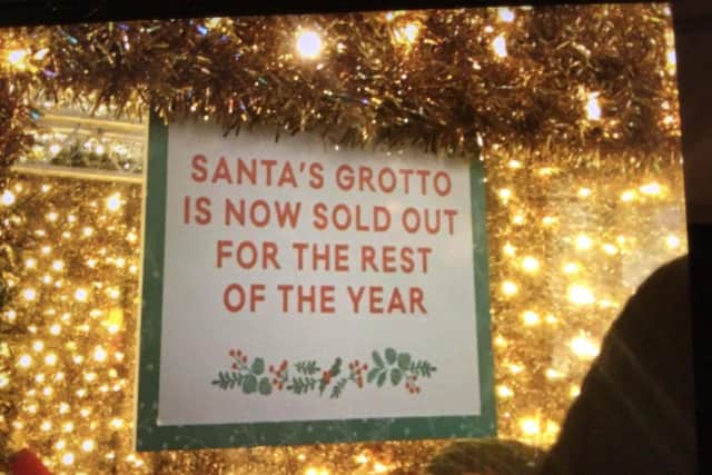 The sign with the message that Santa's Grotto had sold out at least a week before Christmas