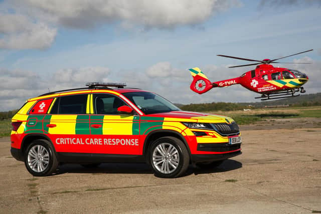 The helicopter and one of the charity's Critical Care Response cars