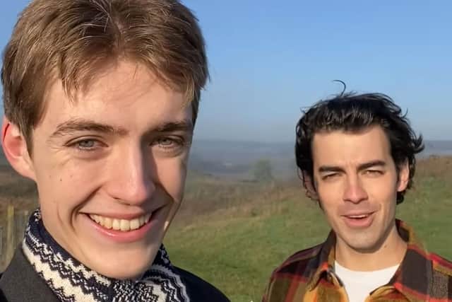Francis Bourgeois and Joe Jonas 'chilled' in a field near Central Milton Keynes station