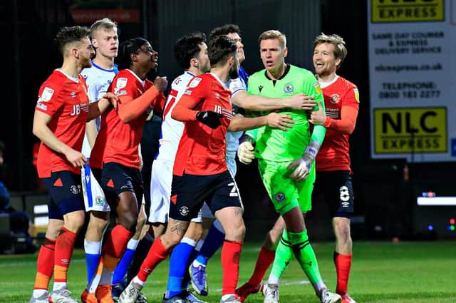 Luton and Blackburn's players are involved in a late melee at Kenilworth Road