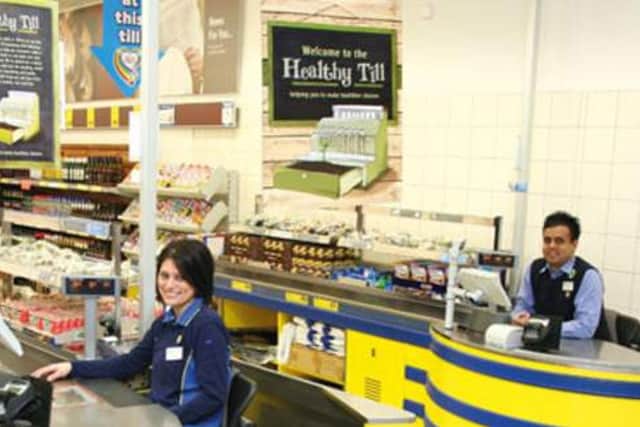 The woman was struggling at the checkout in Lidl