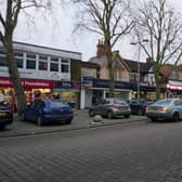 Cars parked on the pavement in Bletchley's Queensway