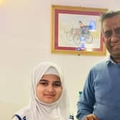 Milton Keynes mayor Councillor Mohammed Khan was presented with a poster to mark World Hijab Day by nine-year-old campaigner Maryam Jazeem