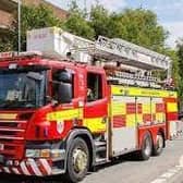 Firefighters used hydraulic rescue equipment to release a man from his car and  two women, who suffered injuries, from the second car