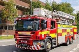 Firefighters used hydraulic rescue equipment to release a man from his car and  two women, who suffered injuries, from the second car