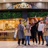 Staff at Pizza Express at the Xscape celebrate re-opening after a major refurbishment