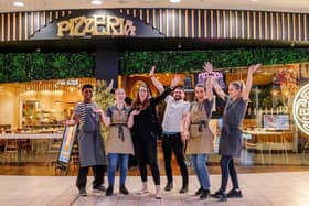 Staff at Pizza Express at the Xscape celebrate re-opening after a major refurbishment