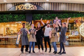 Staff at Pizza Express at the Xscape celebrate re-opening after a major refurbishment