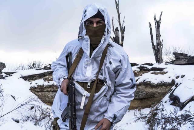 A Ukrainian soldier in a trench in the east of the country (photo: Brendan Hoffman/Getty Images)