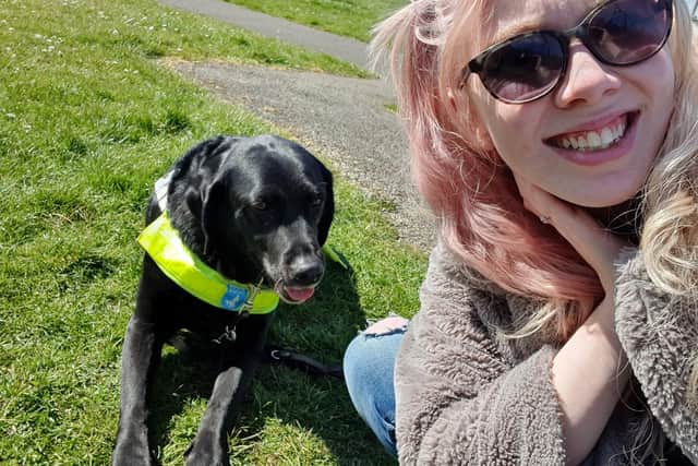 Hannah Burgess with her guide dog in Milton Keynes
