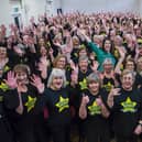 Caroline Redman Lusher with members of Bedford, Milton Keynes, Hitchin and Biggleswade Rock Choir (Picture courtesy of Martin Mckay)