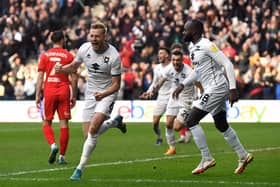 Harry Darling celebrates his equaliser against Wigan