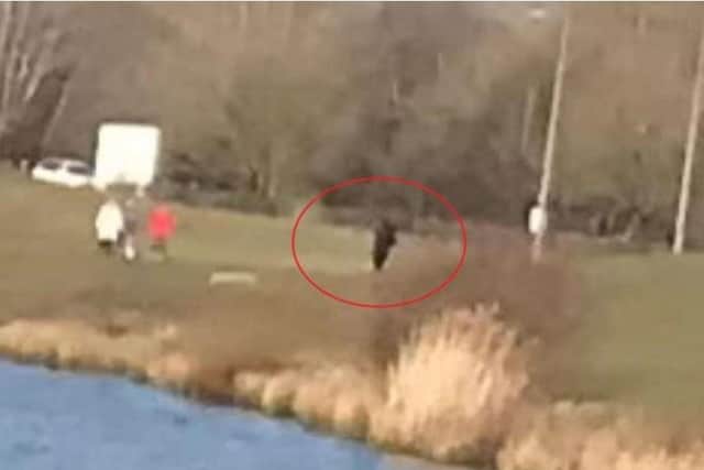 Other people were pictured at the lake that morning. Police want to speak to them
