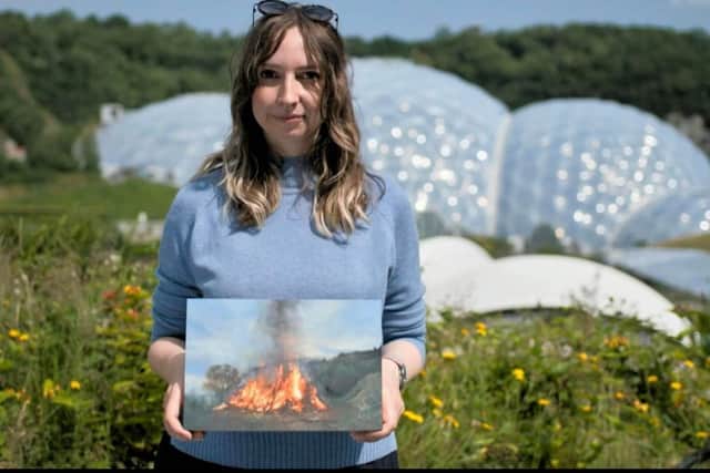 Elisha Enfield with her bonfire painting. Photo: Sky TV