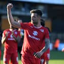 Daniel Harvie celebrates at full-time against Cambridge United on Saturday 