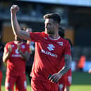 Daniel Harvie celebrates at full-time against Cambridge United on Saturday 