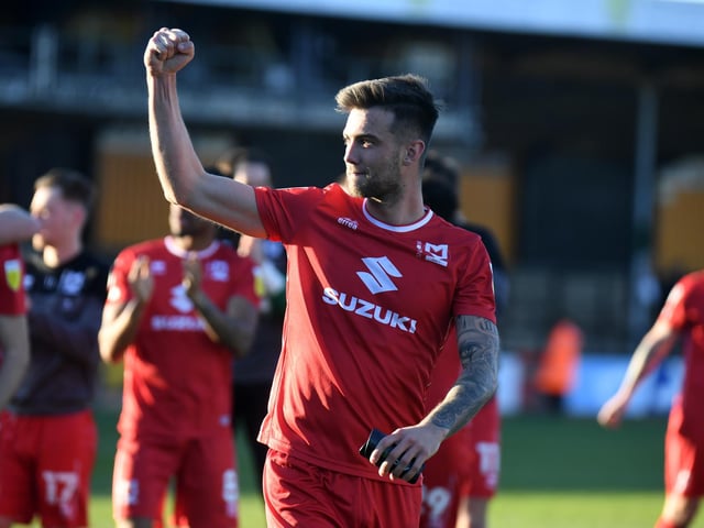 Daniel Harvie celebrates at full-time