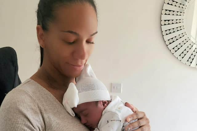 Natalie with her new daughter