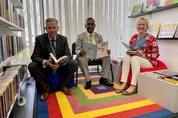 Trying out the new library. From left: MK Council's director of children’s services Mac Heath, Mayor Cllr Mohammed Khan and Cllr Zoe Nolan, the Cabinet member for children and families.