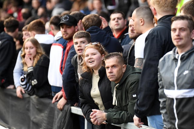 MK Dons fans in the away end at AFC Wimbledon