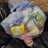 Can you spot the 'contaminated' items in this recycling sack?