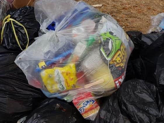 Can you spot the 'contaminated' items in this recycling sack?