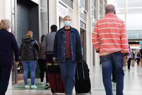 Some shoppers bought trolleys and suitcases to load their purchases. Photo: Jane Russell