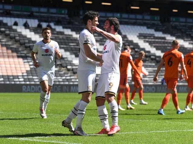Will Grigg and Scott Fraser celebrate