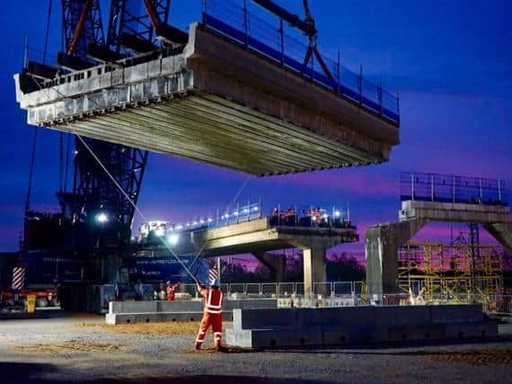 Huge cranes lifted in sections of the east West Rail flyover at Bletchley last year