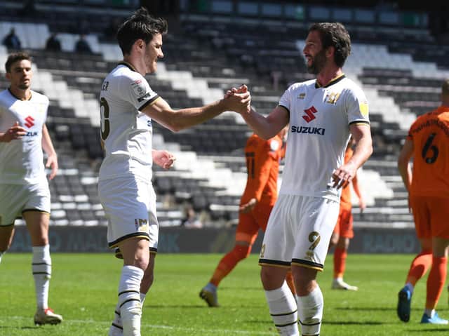 Scott Fraser and Will Grigg celebrate