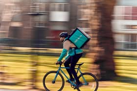 A deliveroo driver in action in Buckinghamshire