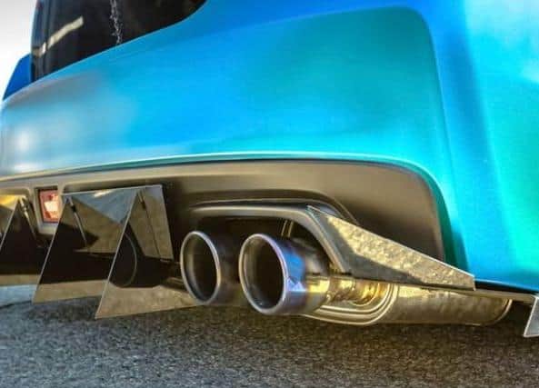 The car has a modified exhaust