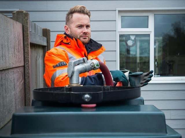 An HVO supplier filling up a tank with the new, fossil free liquid fuel