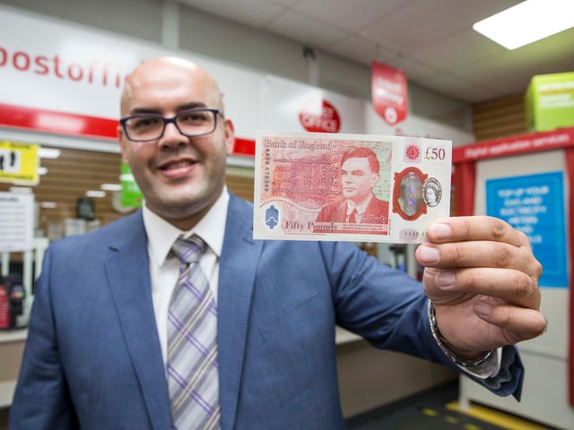 Bletchley Postmaster Ahmed Butt with the new note