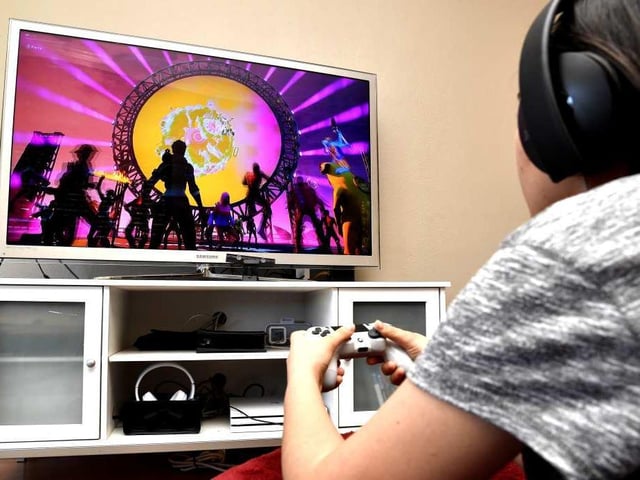 Fortnite is a popular online game. Photo is by Getty Images and is posed by models.