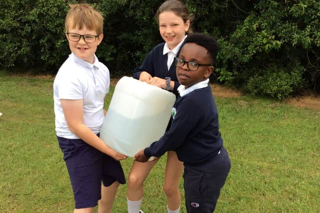 The youngsters had a taste of carrying water