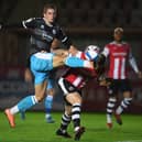 Max Watters in action for Crawley