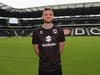 Who is MK Dons' latest signing Aden Baldwin?