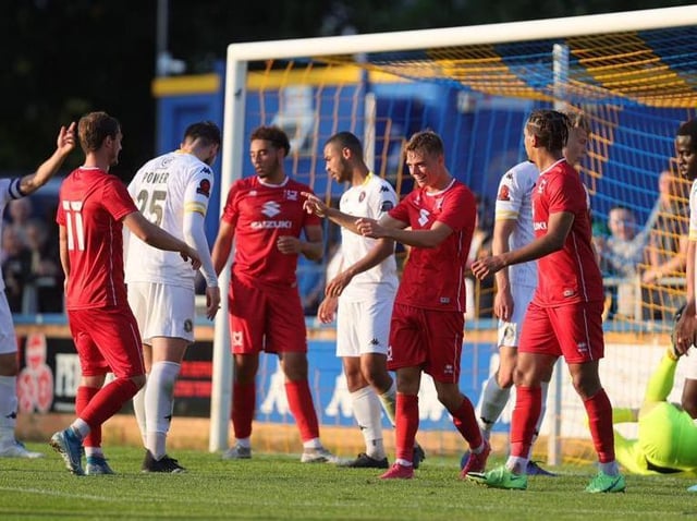 Scott Twine celebrates his second goal of the night at King's Lynn