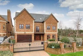 The six bedroom detached property has a gated entrance