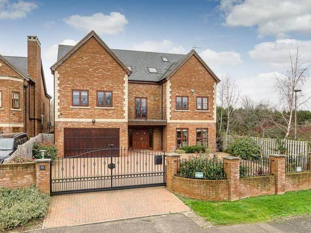 The six bedroom detached property has a gated entrance