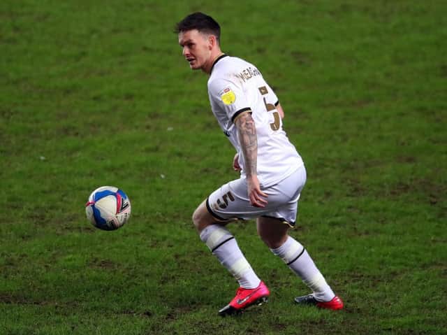 Josh McEachran has signed a new deal to stay at MK Dons