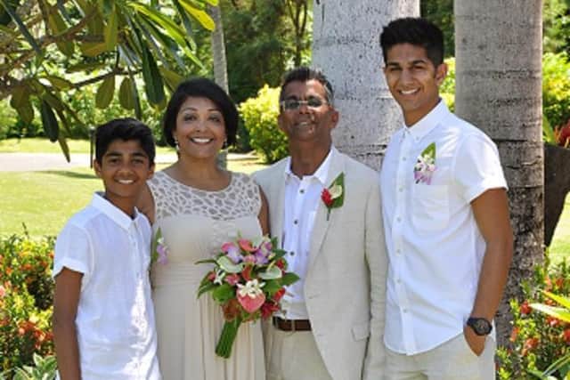 Sangita and Bharat with their two sons Kiran and Joel