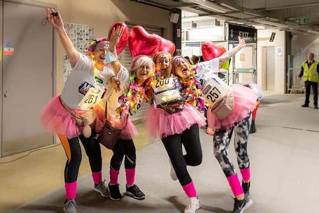 Runners and walkers donned neon 80s gear to take part in this year's Moo Weekender