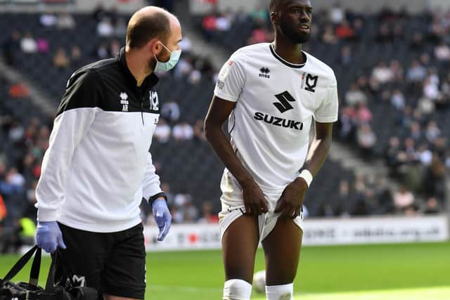 Mo Eisa limped out of Dons’ game with Accrington two weeks ago