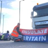 Climate change campaigners block parts of M25 in Hertfordshire for second time this week (C) Insulate Britain