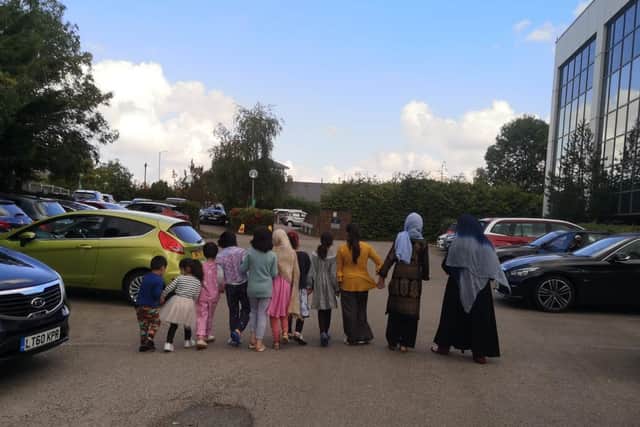 This is one single family of refugees living in the Newport Pagnell hotel. We have not shown their faces to protect the parents.